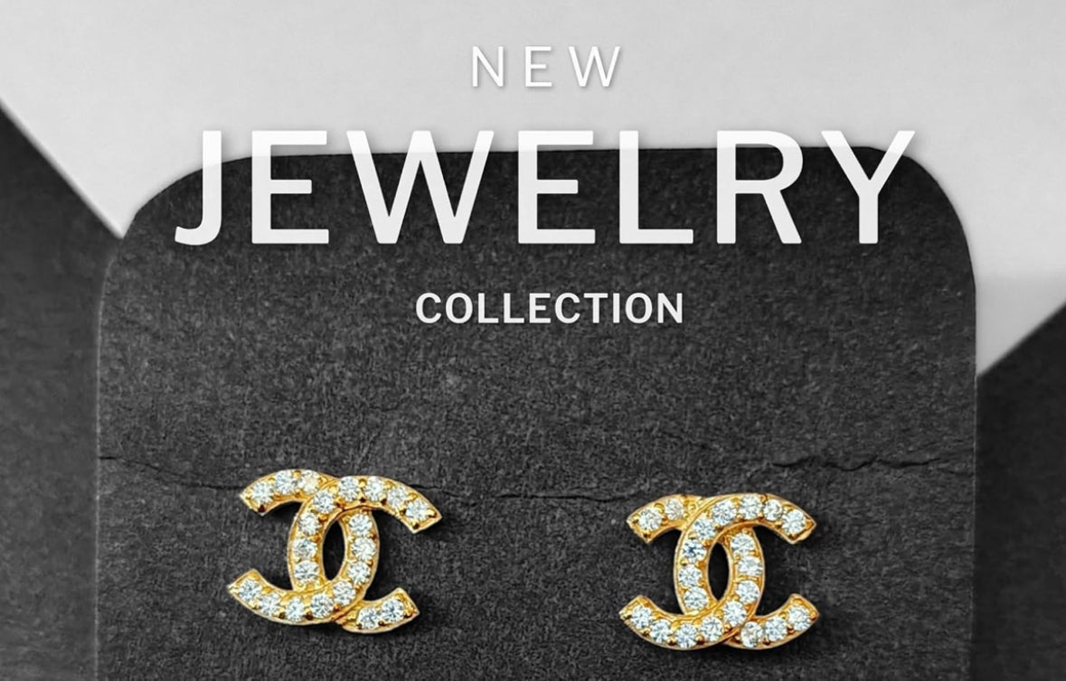 Dobbelt c logo nitter med zirconia guld tone