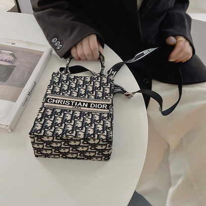 Bolso tote clásico con correa cruzada