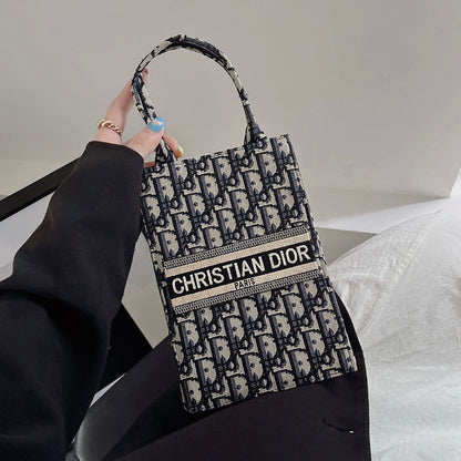 Bolso tote clásico con correa cruzada