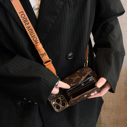 Edistyksellinen nahkainen iPhone-kotelo, jossa lompakko ja ruskea hihna