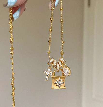 Elegant Cross & Lock Pendant Necklace – Dainty Gold Chain with Crystal Charms