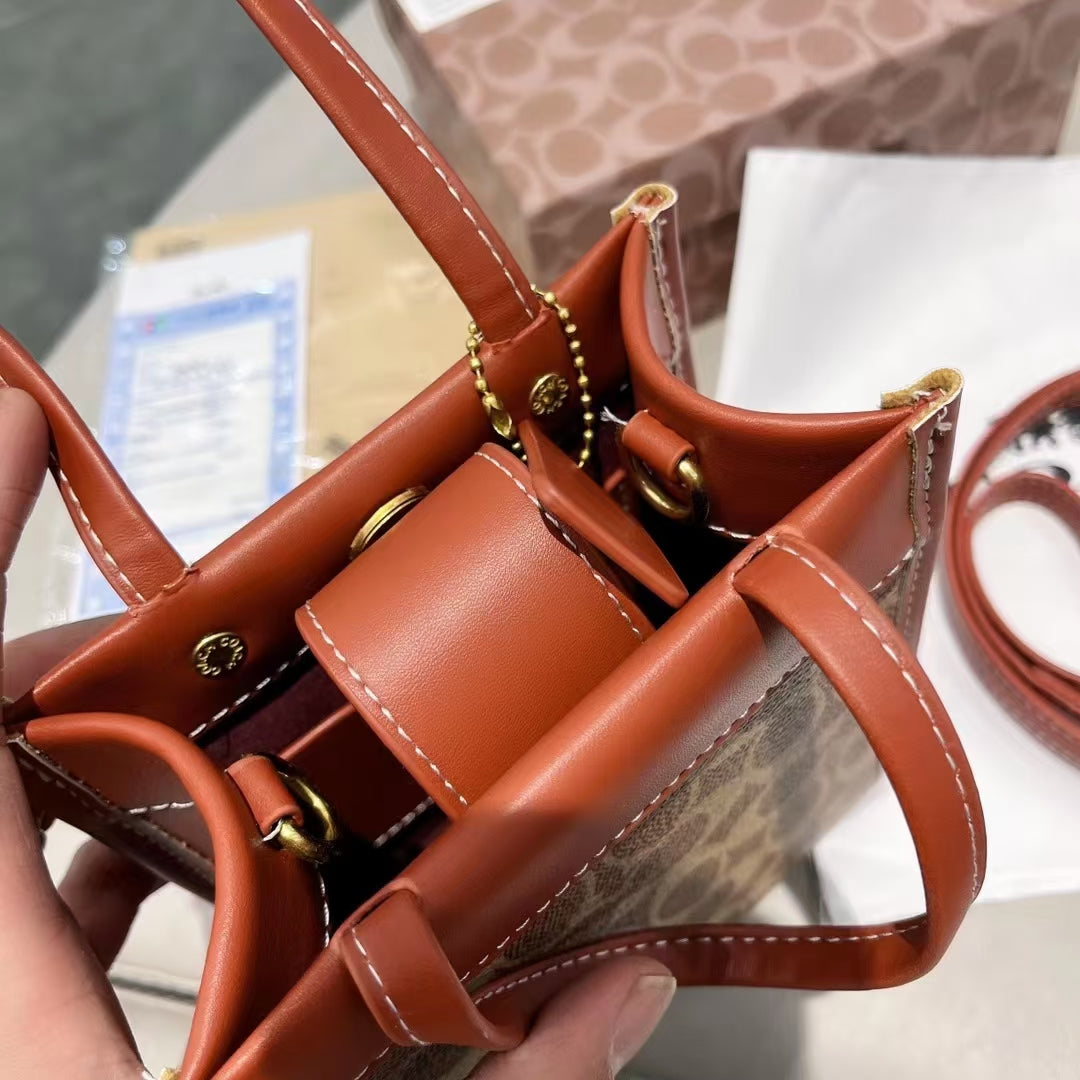 エレガントなレザーハンドバッグ：軽い贅沢のタッチ