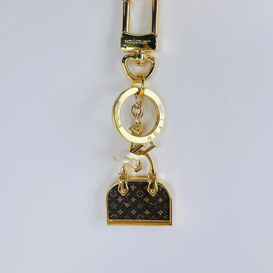 Дизайнерская мини -сумка для ключей