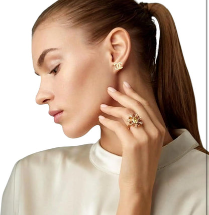 Dobbelt c logo nitter med zirconia guld tone