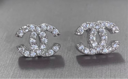 Dobbelt c logo nitter med zirconia guld tone