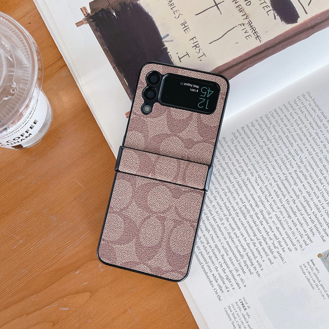Capa de telefone Samsung Coach Z Flip/Z Fold com alça de dedo
