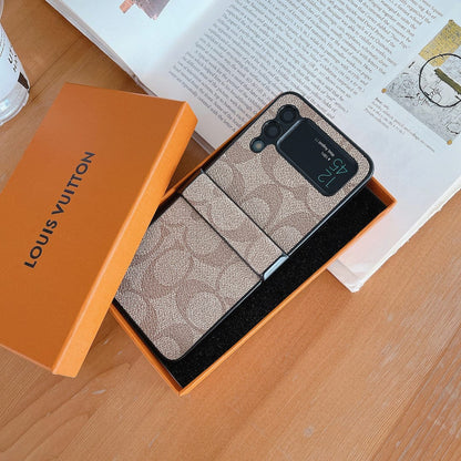 Capa de telefone Samsung Coach Z Flip/Z Fold com alça de dedo