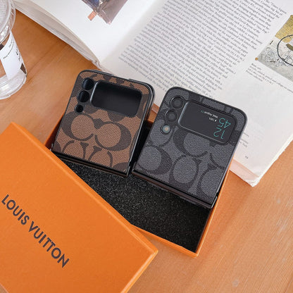 Capa de telefone Samsung Coach Z Flip/Z Fold com alça de dedo