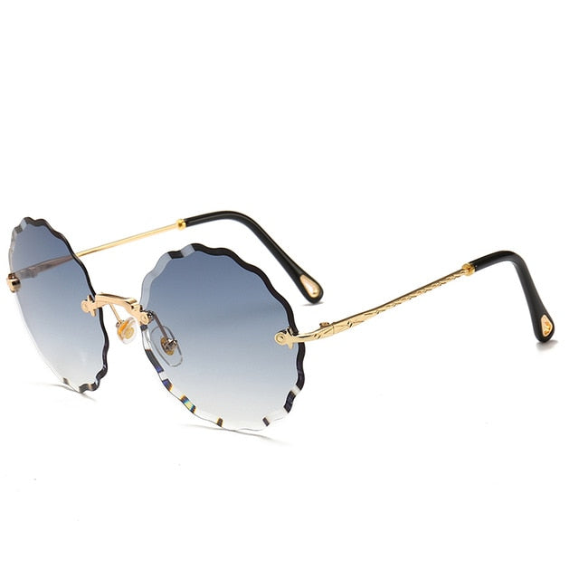 Ylelliset pyöreät aurinkolasit naisten merkkisuunnittelijat reunattomat aurinkolasit naisten värisävyyn muodikkaille Rosie-laseille